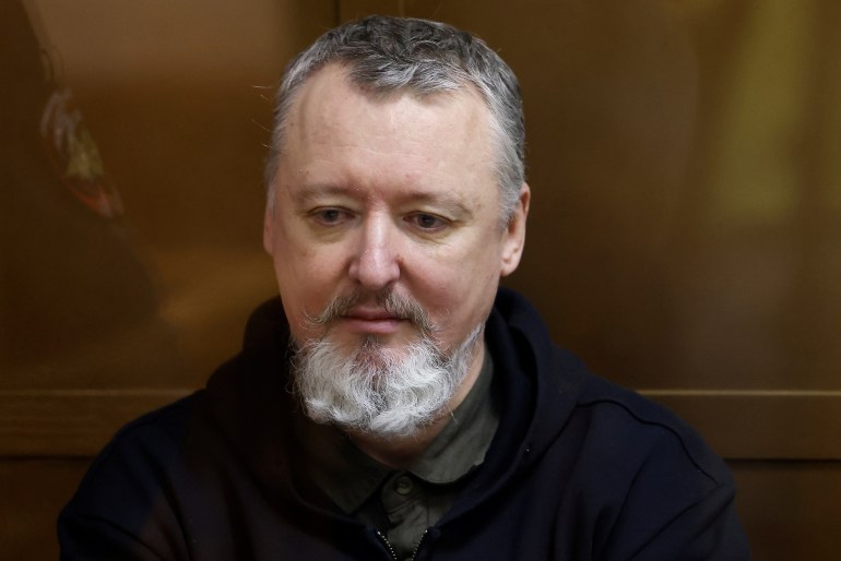 Russian prominent nationalist, former military commander and Kremlin critic Igor Girkin, also known as Igor Strelkov, who is charged with inciting extremist activity, sits behind a glass wall of an enclosure for defendants before a court hearing in Moscow, Russia, January 25, 2024. REUTERS/Maxim Shemetov