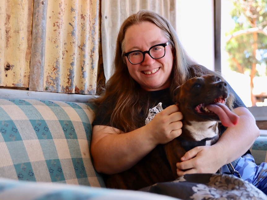 woman and dog on the couch