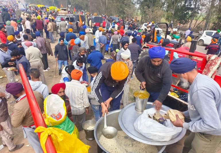 Farmers marching to New Delhi gather near the Punjab-Haryana border at Shambhu, India