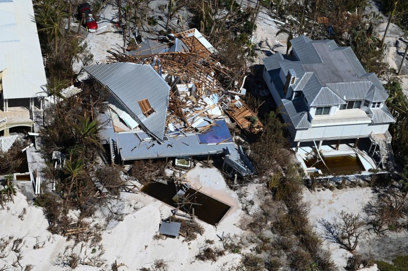 A U.S. Coast Guard Air Station Clearwater MH-60 Jayhawk aircrew conducts overflights along the coast of western Florida following Hurricane Ian making landfall in early October 2022. The storm at its peak was a Category 5 hurricane. On Monday, a study was published suggesting a Category 6 be added to the warning system. File Photo by POC3 Riley Perkofski/U.S. Coast Guard/UPI