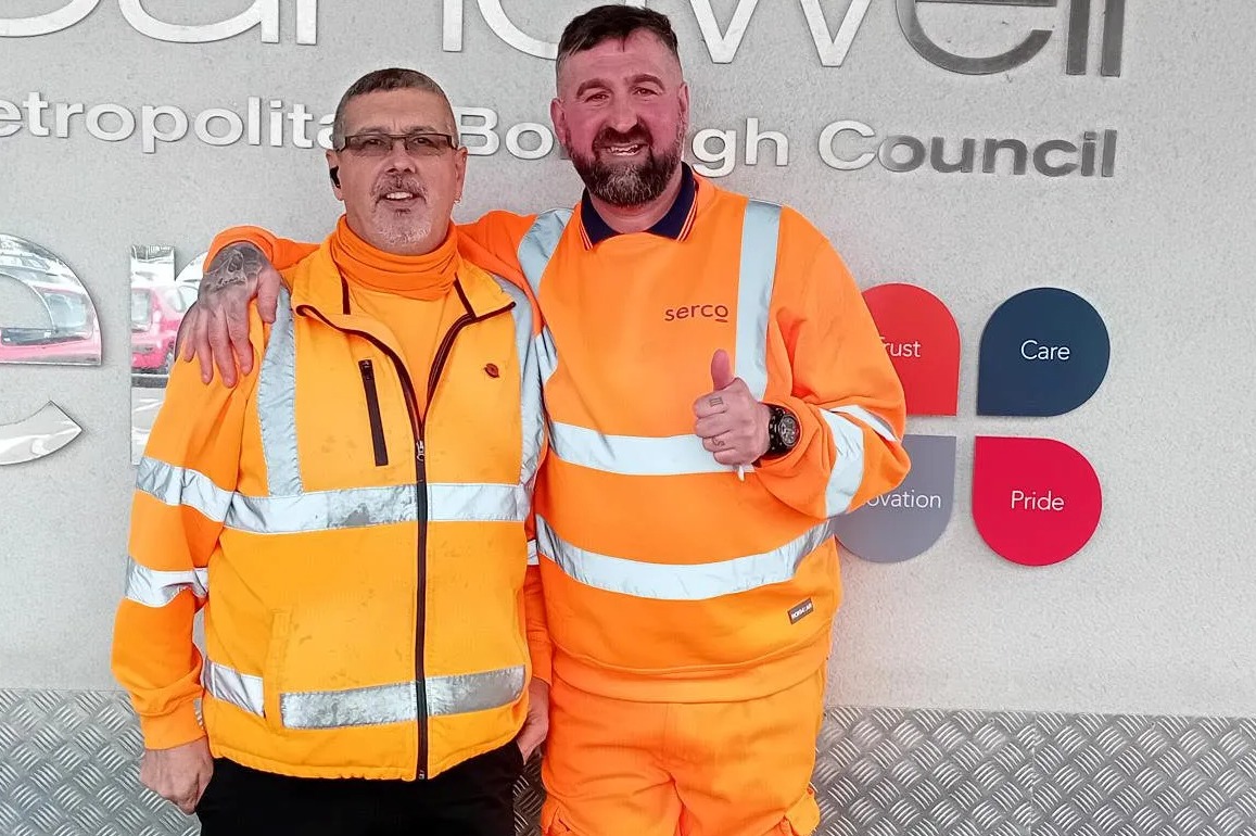 Steve Whitehouse (right) rescued two people and a dog from devastating fire during his morning rounds with Kevin Marriott