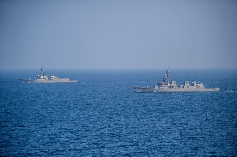 CENTCOM said Wednesday it thwarted a Houthi missile launch targeting vessels in the Red Sea and later "took no action "when an anti-ship ballistic missile was launched by Houthi forces under cover of darkness into the Gulf of Aden. Seen here, the guided-missile destroyer USS Mason (DDG 87) sails alongside the Japanese Murasame-class destroyer Akebono (DD 108) in the Gulf of Aden on November 25, 2023. File Photo by PFC3 Samantha Alaman/U.S. Navy/UPI