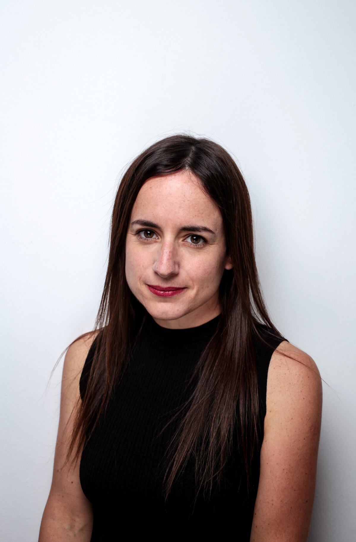 Maite Alberdi wears a sleeveless top for a portrait.