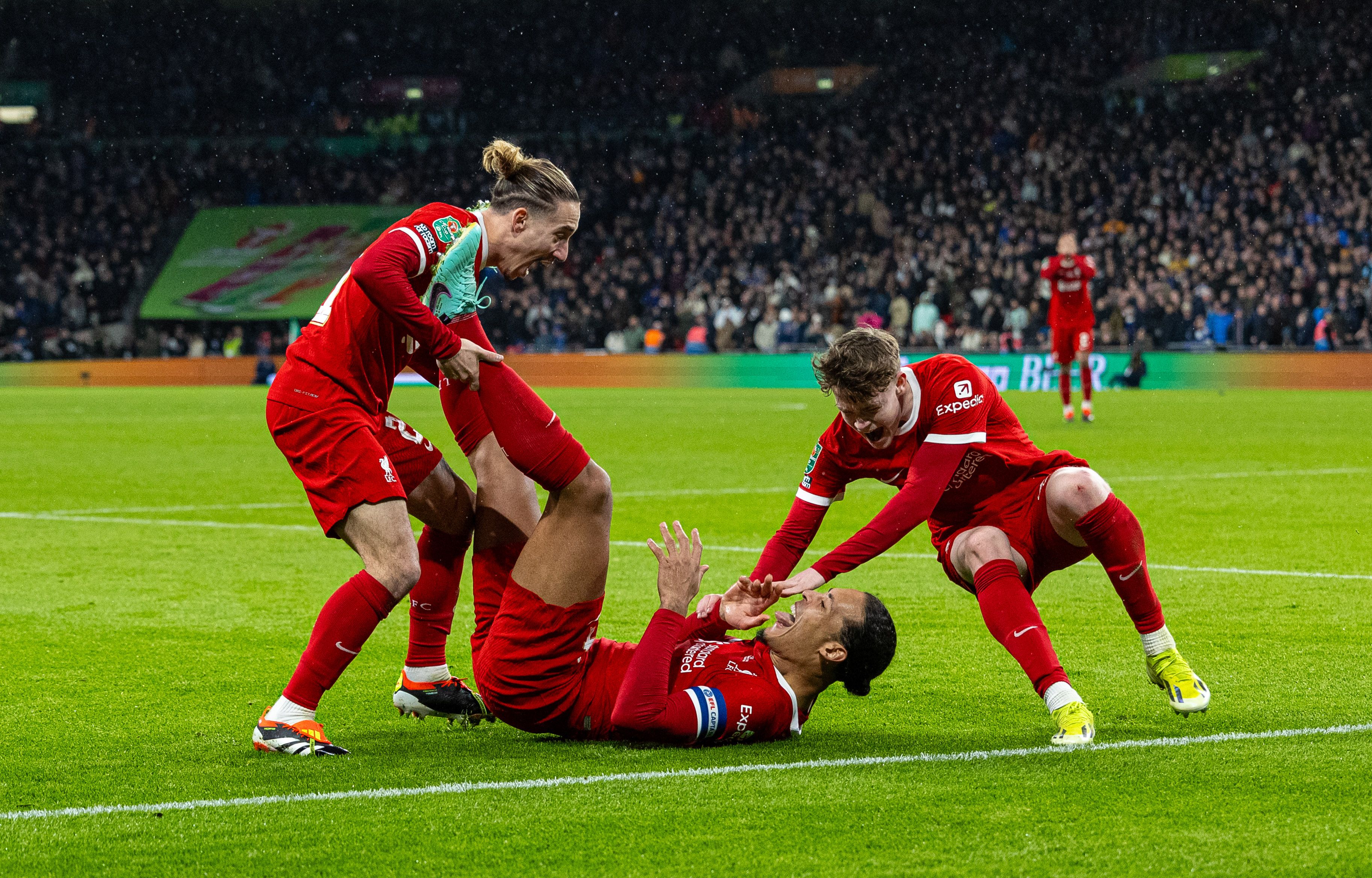 Konstantinos Tsimikas' wild celebration with Virgil van Dijk