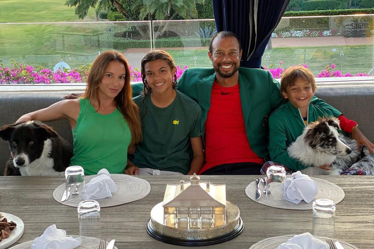 Tiger Woods with his daughter, Sam, son, Charlie, and girlfriend, Erica Herman