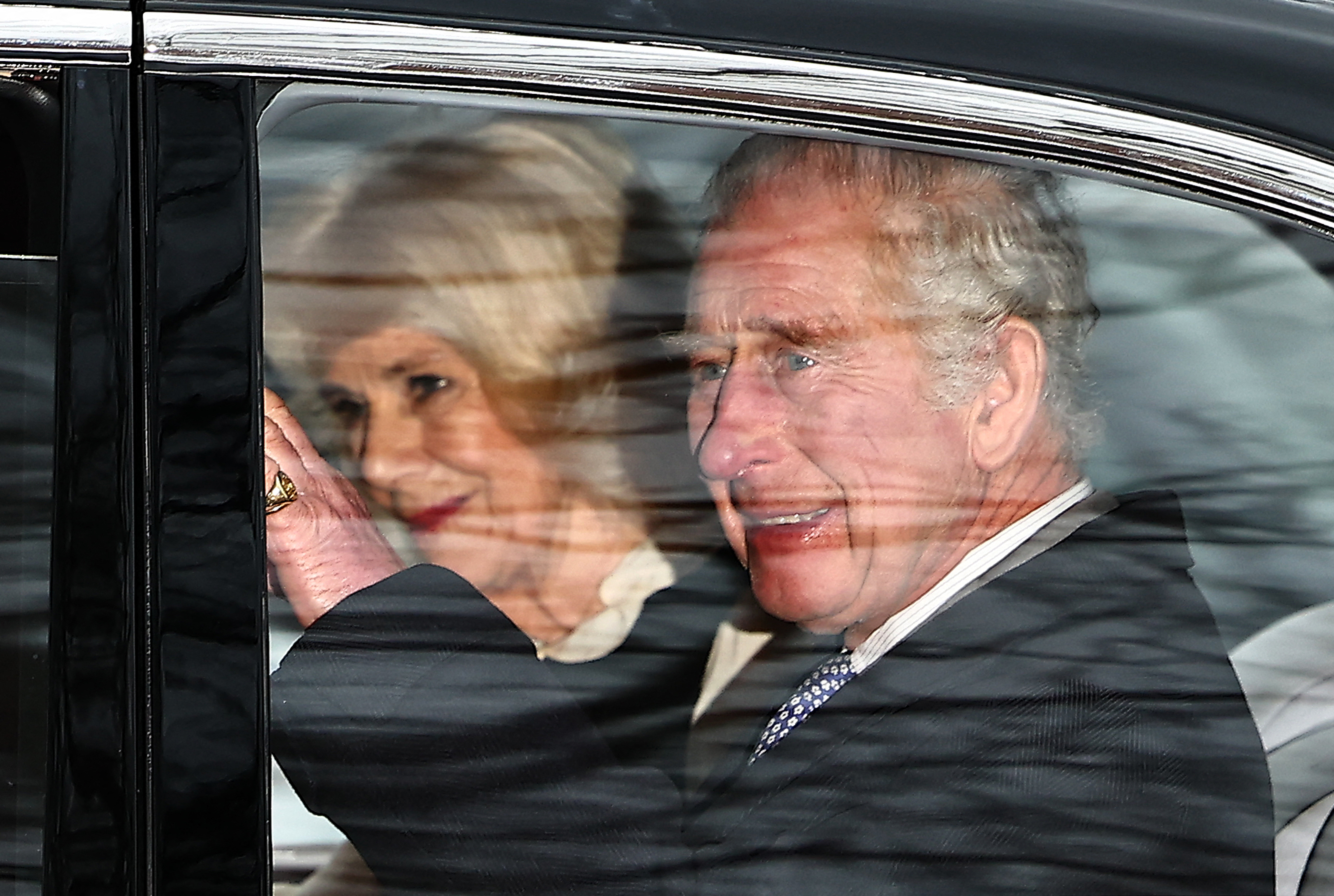 King Charles on his way to catch a helicopter flight to Sandringham yesterday