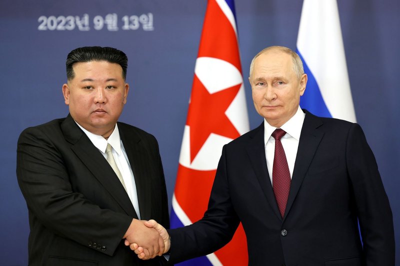 North Korean Leader Kim Jong-un (L) received the gift of a car from Russian President Vladimir Putin (R), state-run Korean Central News Agency reported Tuesday. File Photo by Kremlin POOL/UPI