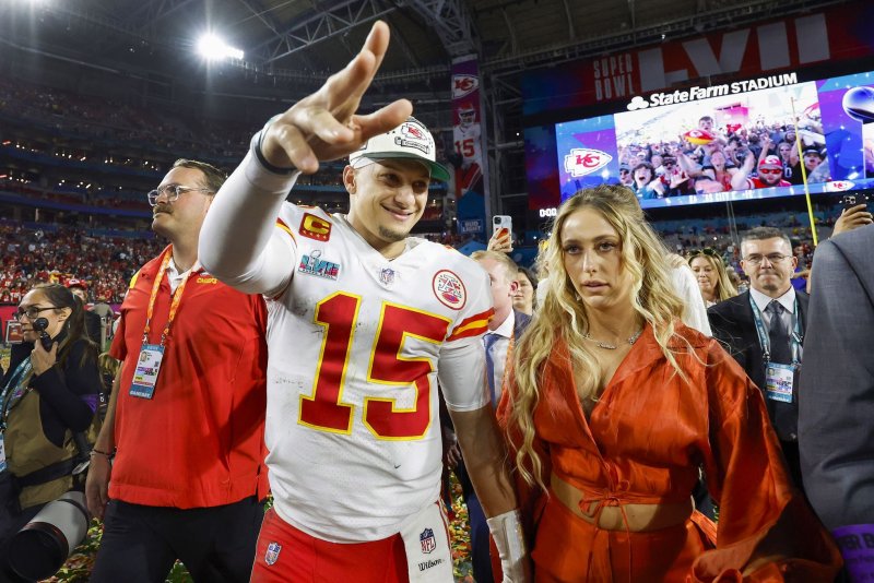 Kansas City Chiefs quarterback Patrick Mahomes (15) celebrates with his wife, Brittany Matthews, after winning Super Bowl LVII over Philadelphia Eagles in Glendale, Ariz., on February 12, 2023. File Photo by John Angelillo/UPI