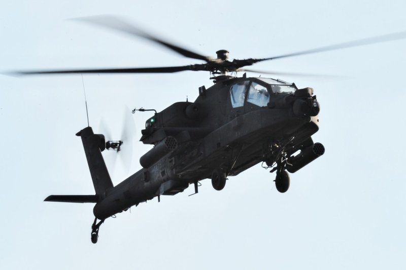 One of the U.S. Army's AH-64E Apache Guardian helicopters takes part with Japan's Ground Self Defense Force in a joint military exercise in 2014. On Friday, a Mississippi National Guard AH-64 Apache helicopter was said to have crashed Friday afternoon in the northeast part of the state. File Photo by Keizo Mori/UPI