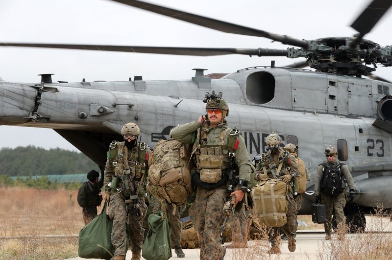 US Marines disembark the Sikorsky CH-53E Super Stallion, a heavy-lift helicopter, during combined airborne and maritime infiltration drills with South Korean and British troops in Pohang, South Korea, in March 2023. File Photo by Yonhap/EPA-EFE