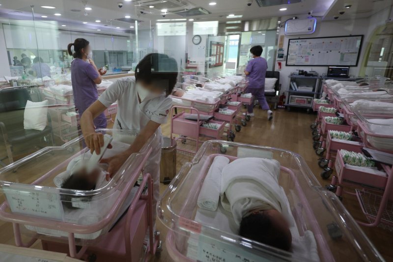 South Korea's fertility rate fell to an all-time low in 2023, its statistics agency announced on Wednesday, fueling concerns of a looming demographic crisis. Pool Photo by Yonhap