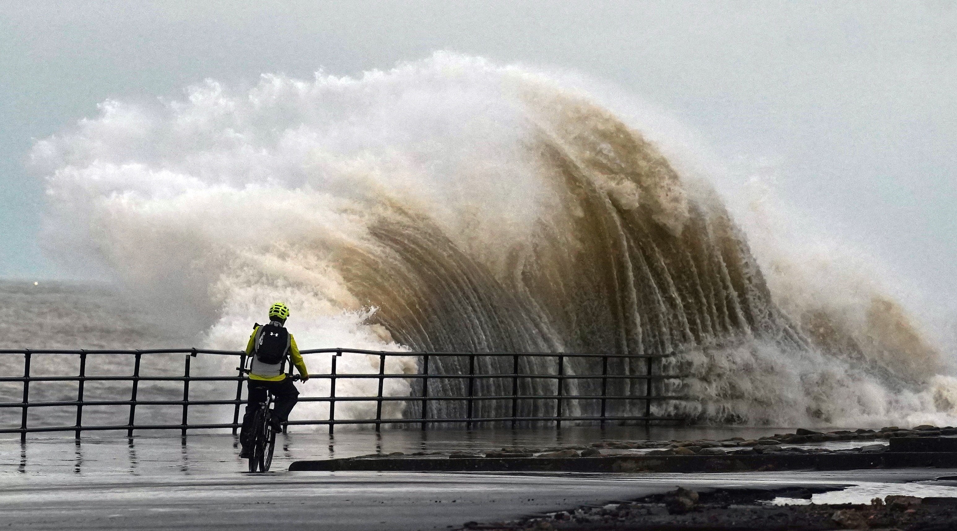 Huge waves crash against the sea wall near Whitley Bay