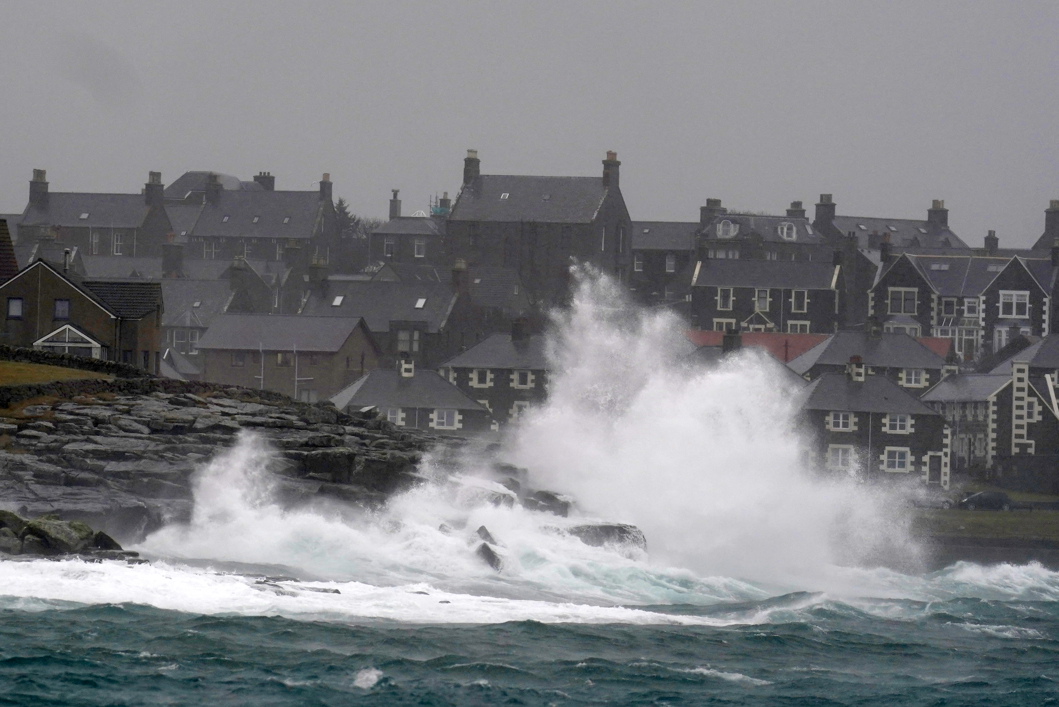 Waves crash off rocks in Lerwick, Shetland