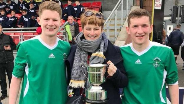 Paddy Burns, Therese Burns and Bobby Burns after winning the Schools' Cup with St Malachy's