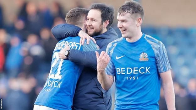 Aaron Prendergast celebrates with Stephen McDonnell