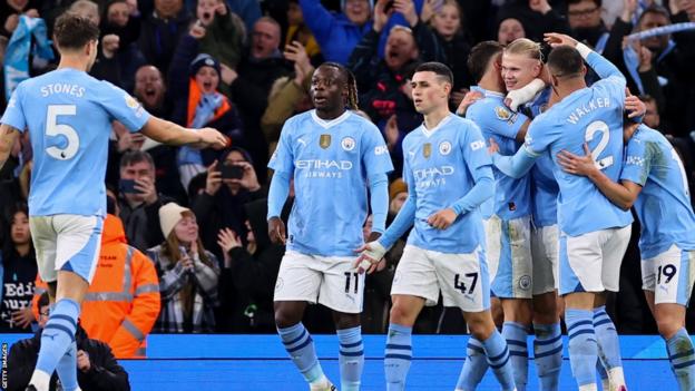 Erling Haaland celebrates with his team-mates after scoring for Manchester City against Brentford in the Premier League