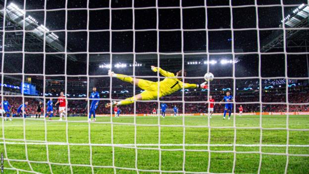 Jack Butland makes a save while playing for Rangers