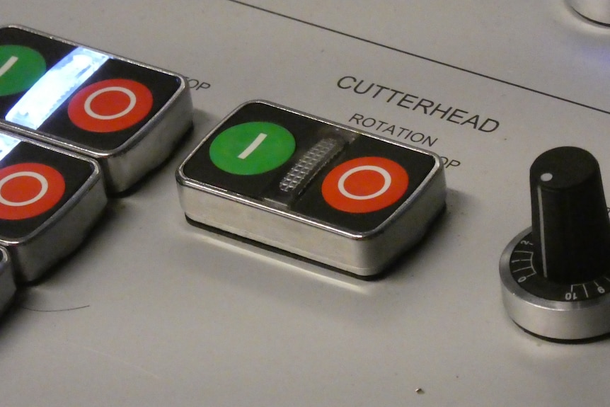 A close-up of a control panel chowing a button labelled "cutterhead".