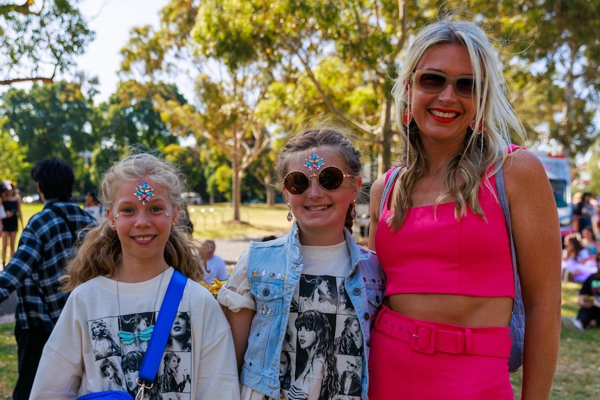 Mum and two kids at Taylor Swift concert