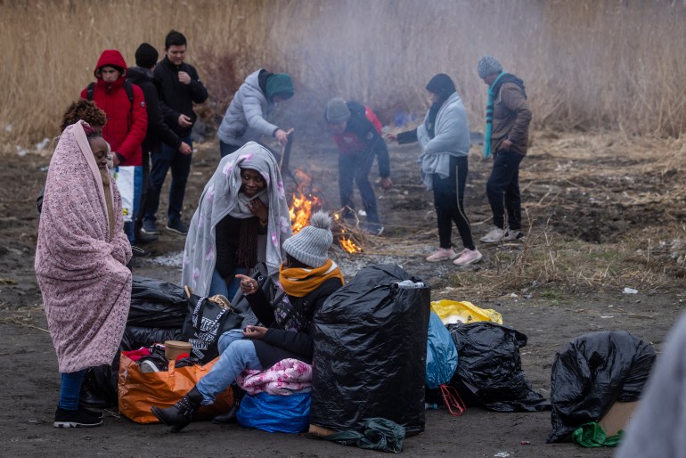 African students fleeing Ukraine stand around at Polish border