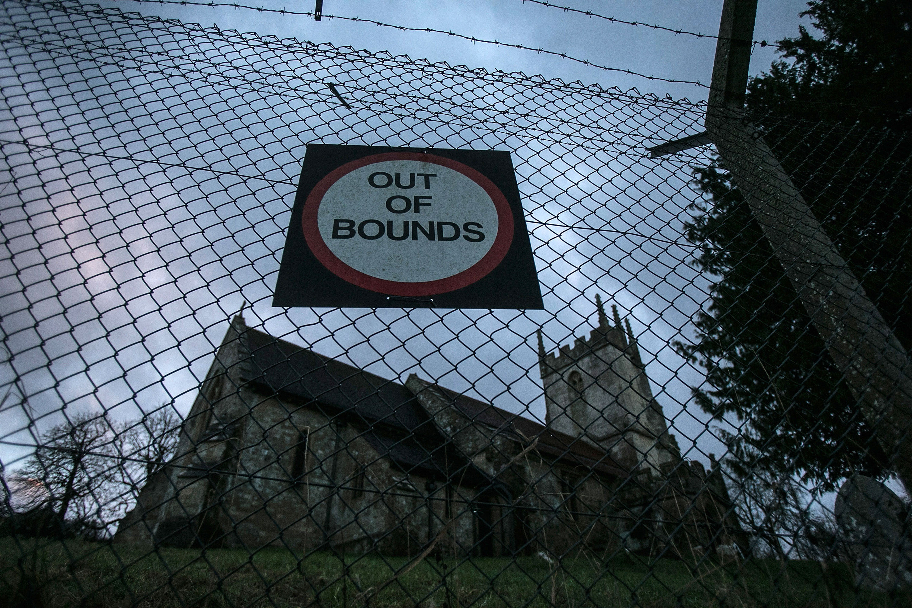 Here a sign reads 'out of bounds' in Imber