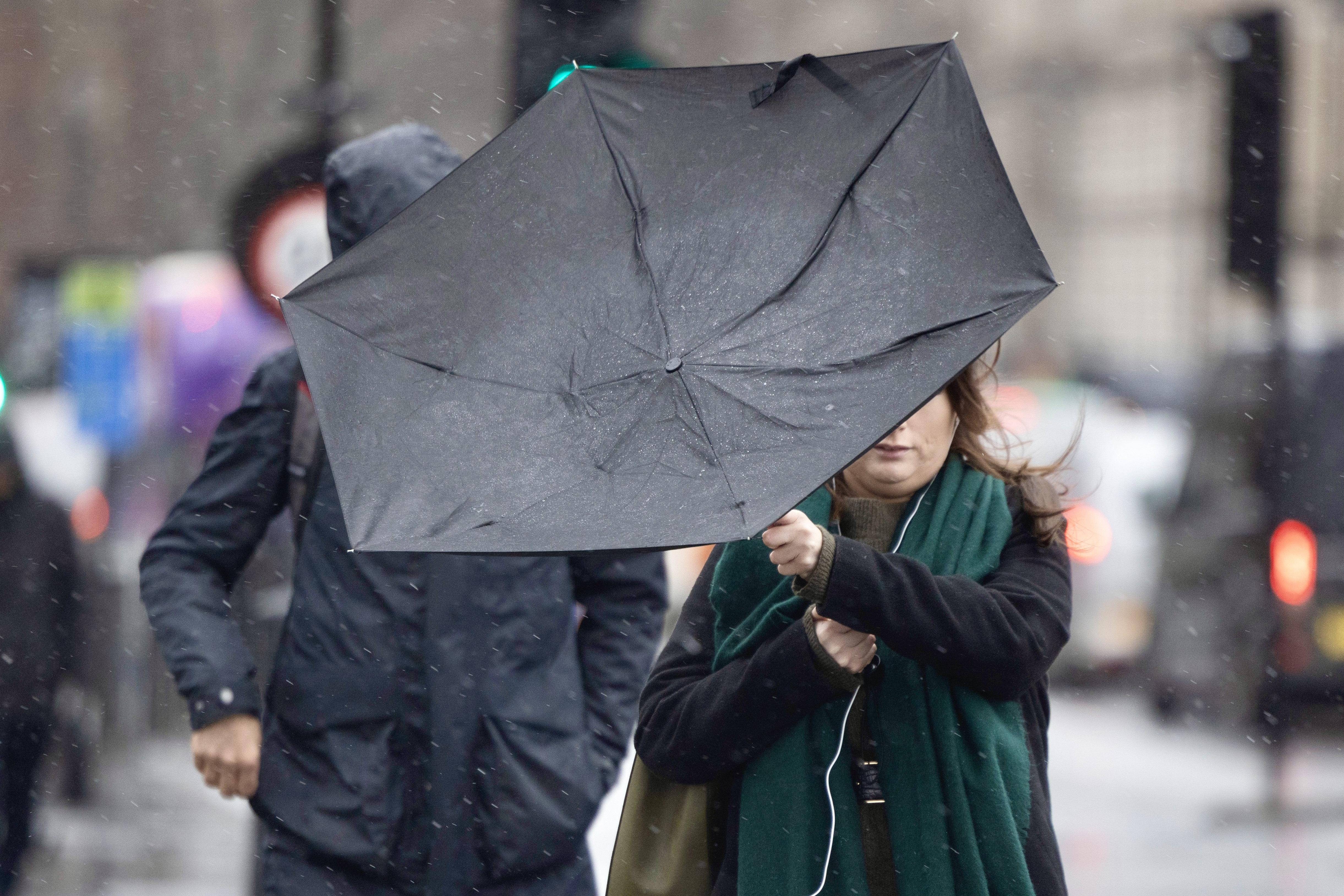 Brisk winds could blow through today, as they did on London's Westminster Bridge on Friday