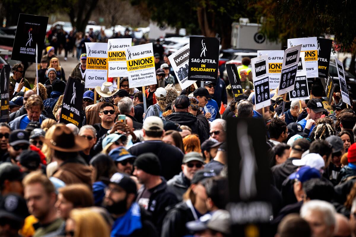 Hollywood crew members union IATSE rally at Woodley Park