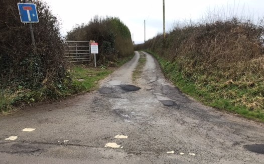 The road Lon Chwarelau, pictured, in Brynsiencyn, leading to Gerald Wilson’s home, was once a public highway but has been classed as private