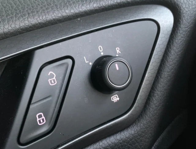 Does your car have the button at the bottom of the dial?