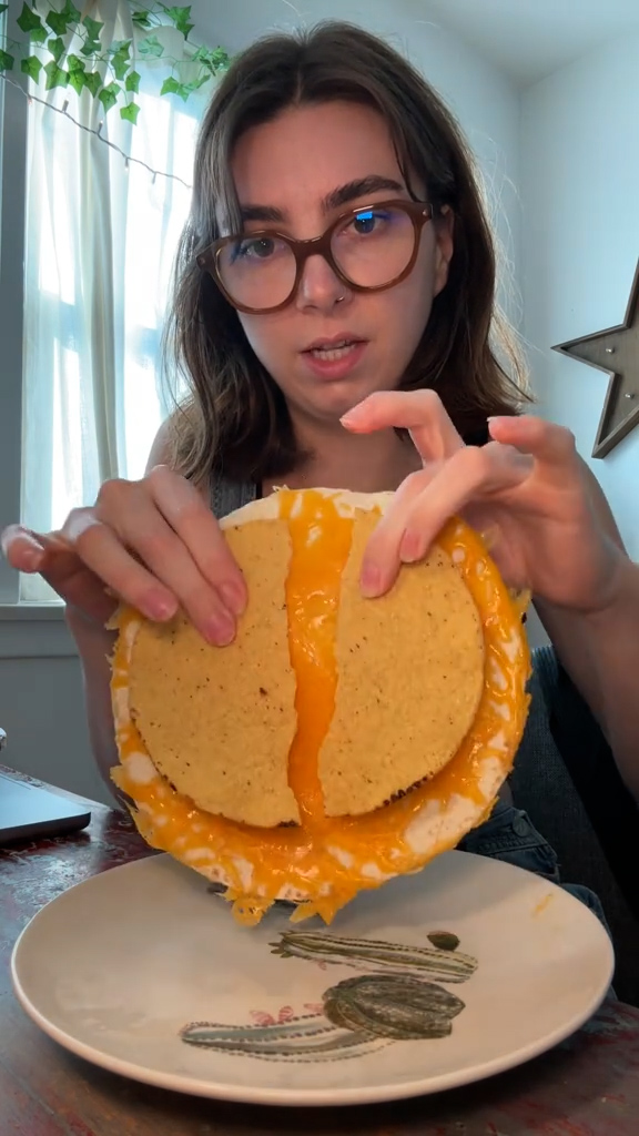 She began with a toasted tortilla with cheddar cheese and tostadas