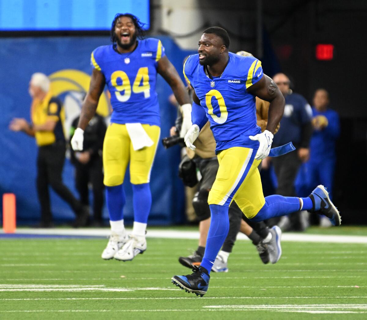 Rams Dejuan Johnson (94) and Byron Young (0) celebrate a missed field goal by the Seahawks in November.