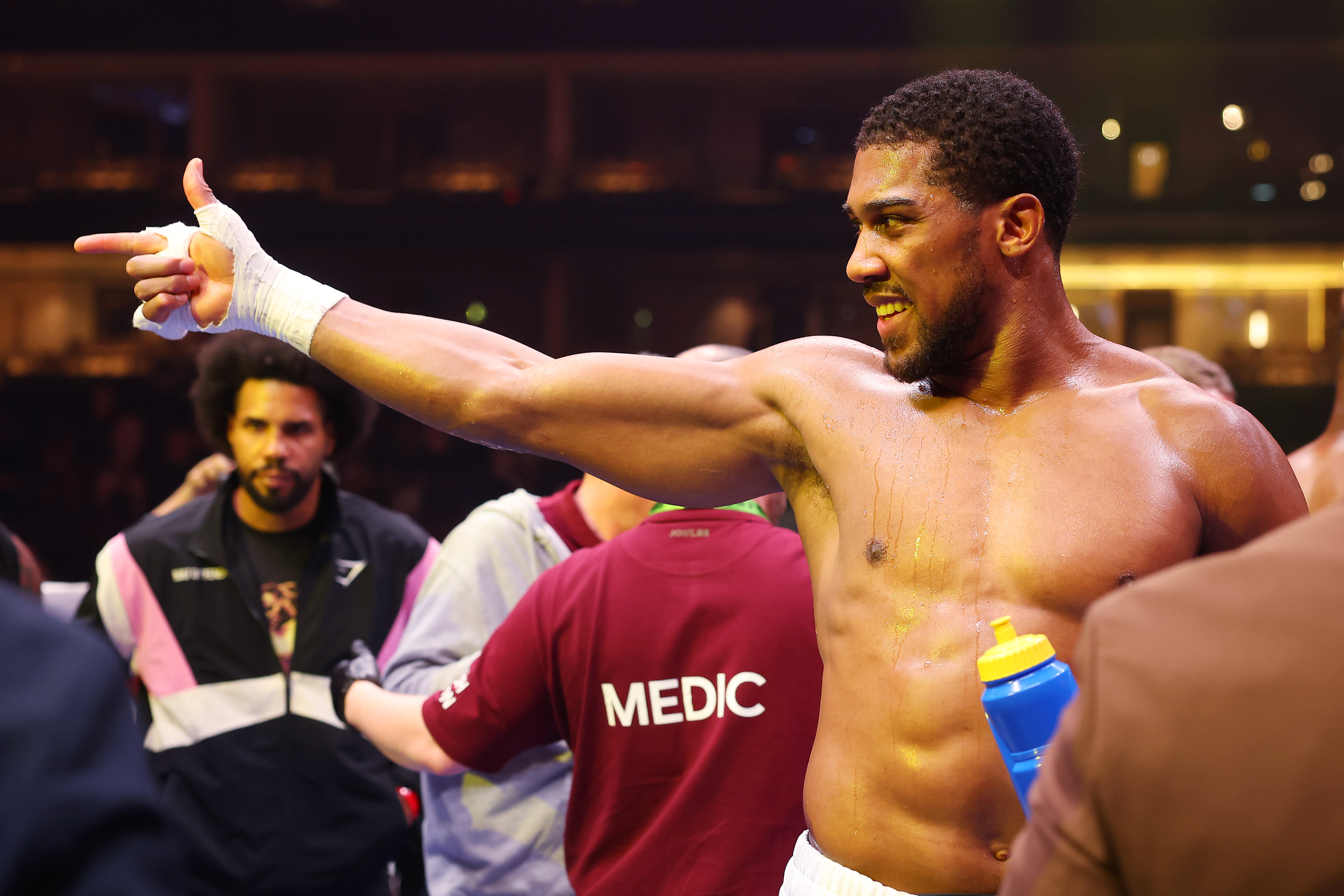 Anthony Joshua celebrates victory against Francis Ngannou