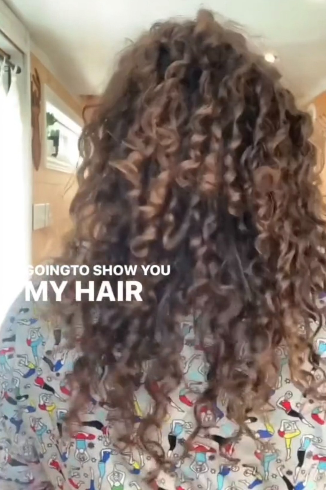 She showed off the back of her now much healthier curls