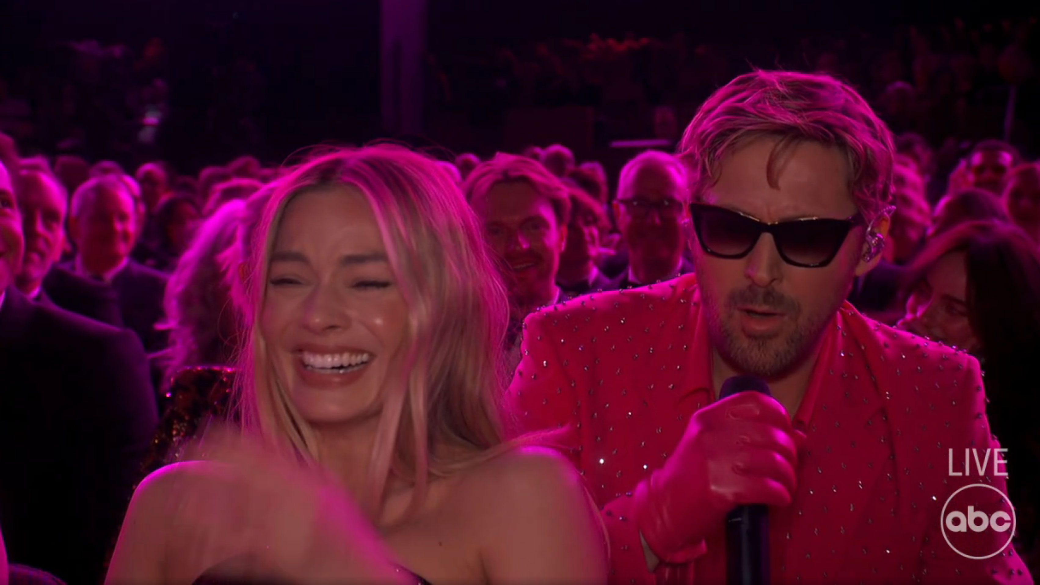 At the beginning of the song, Ryan had Margot bursting out in laughter
