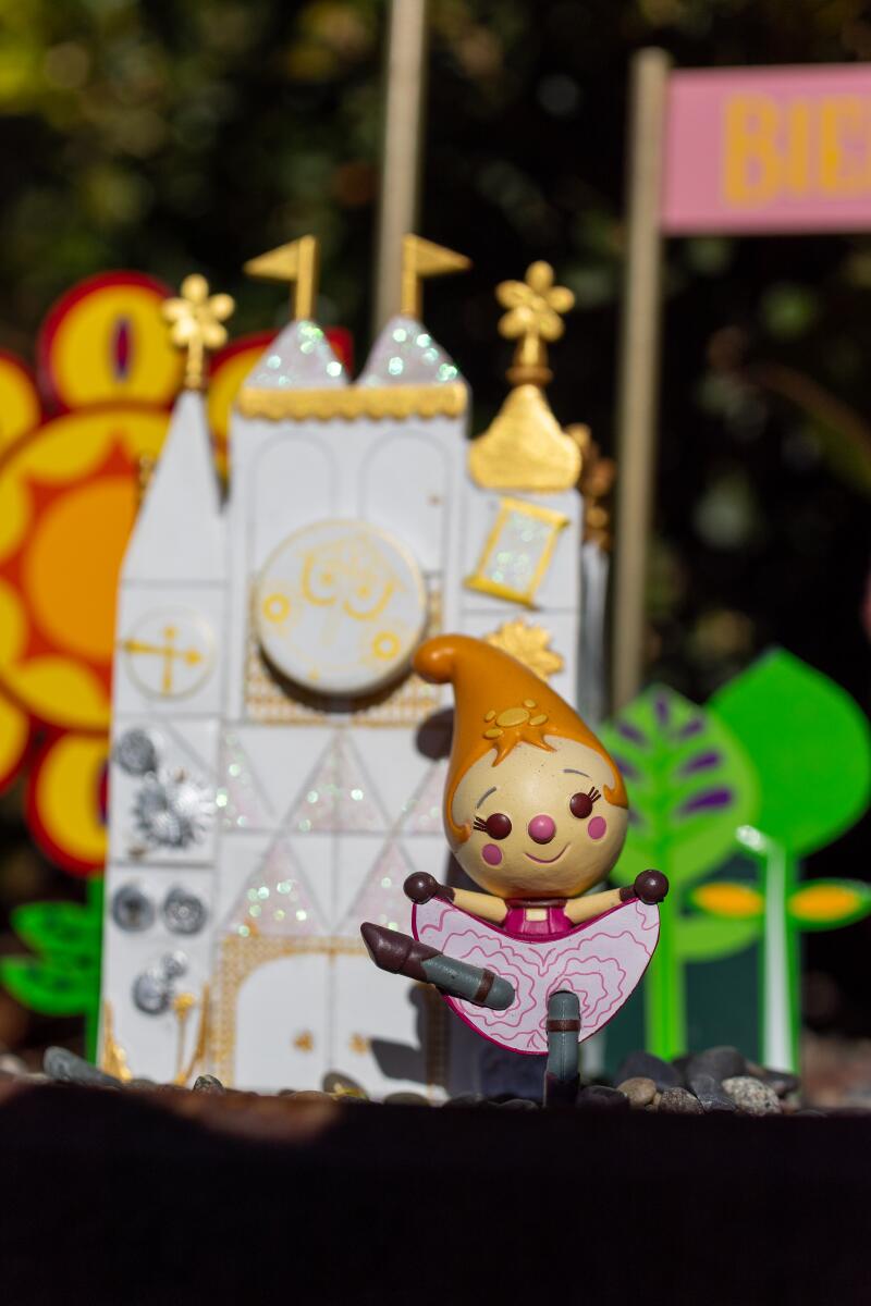 References to Disneyland's It's a Small World ride are nestled in small pots around the Sheegogs' attraction.