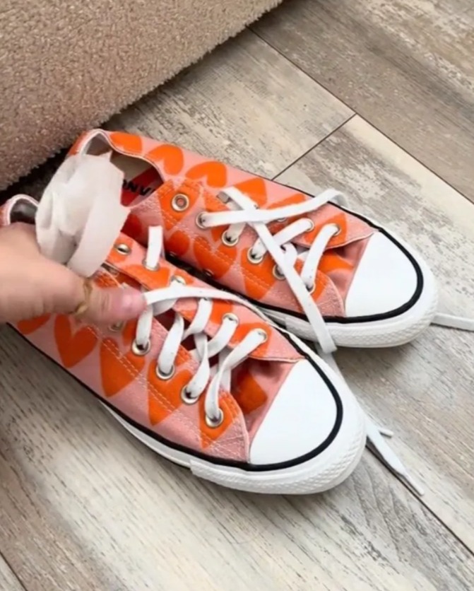 The TikToker showed her followers how she uses dryer sheets to freshen up her shoes