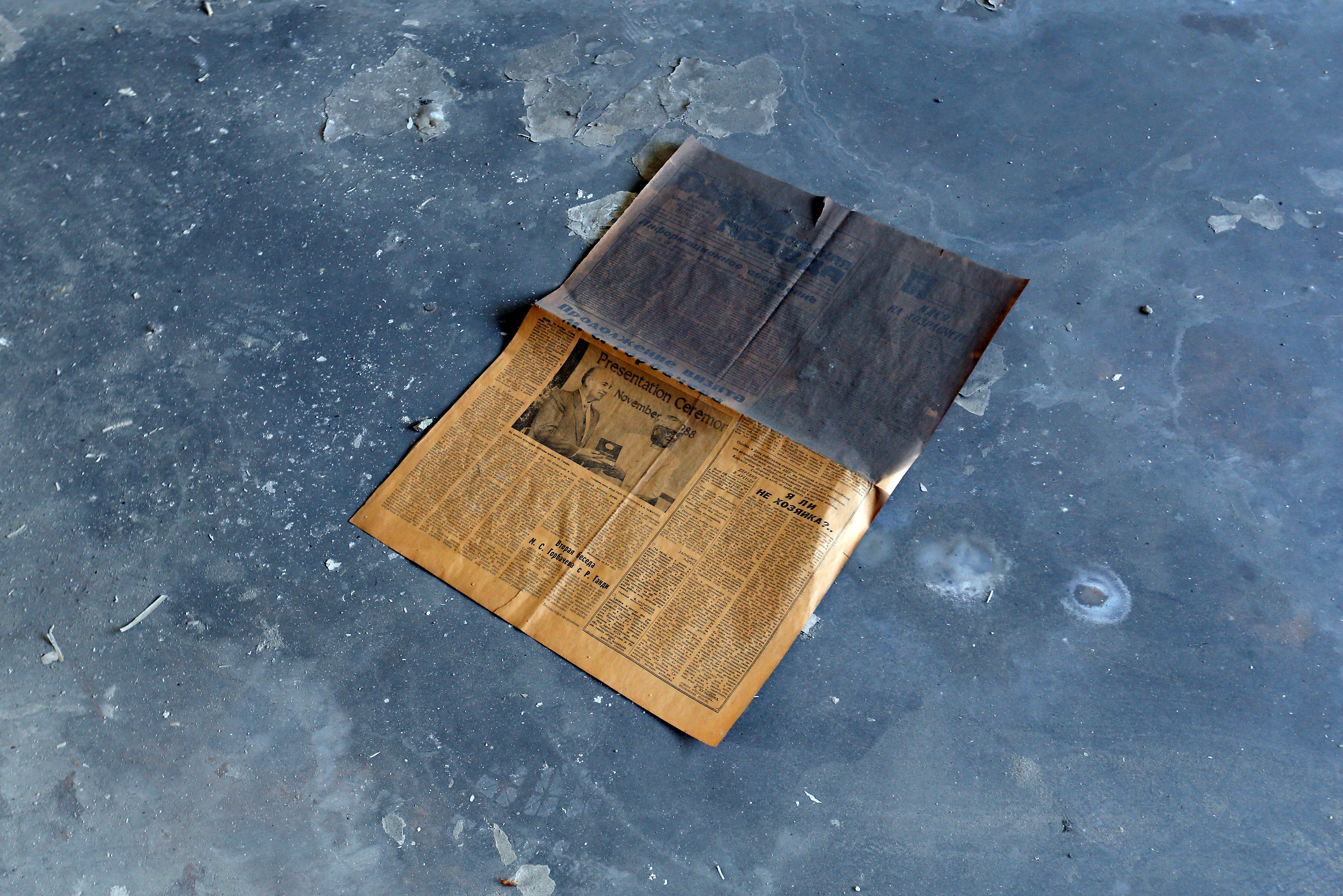 An old Russian newspaper from 1988 left on the floor of the hospital