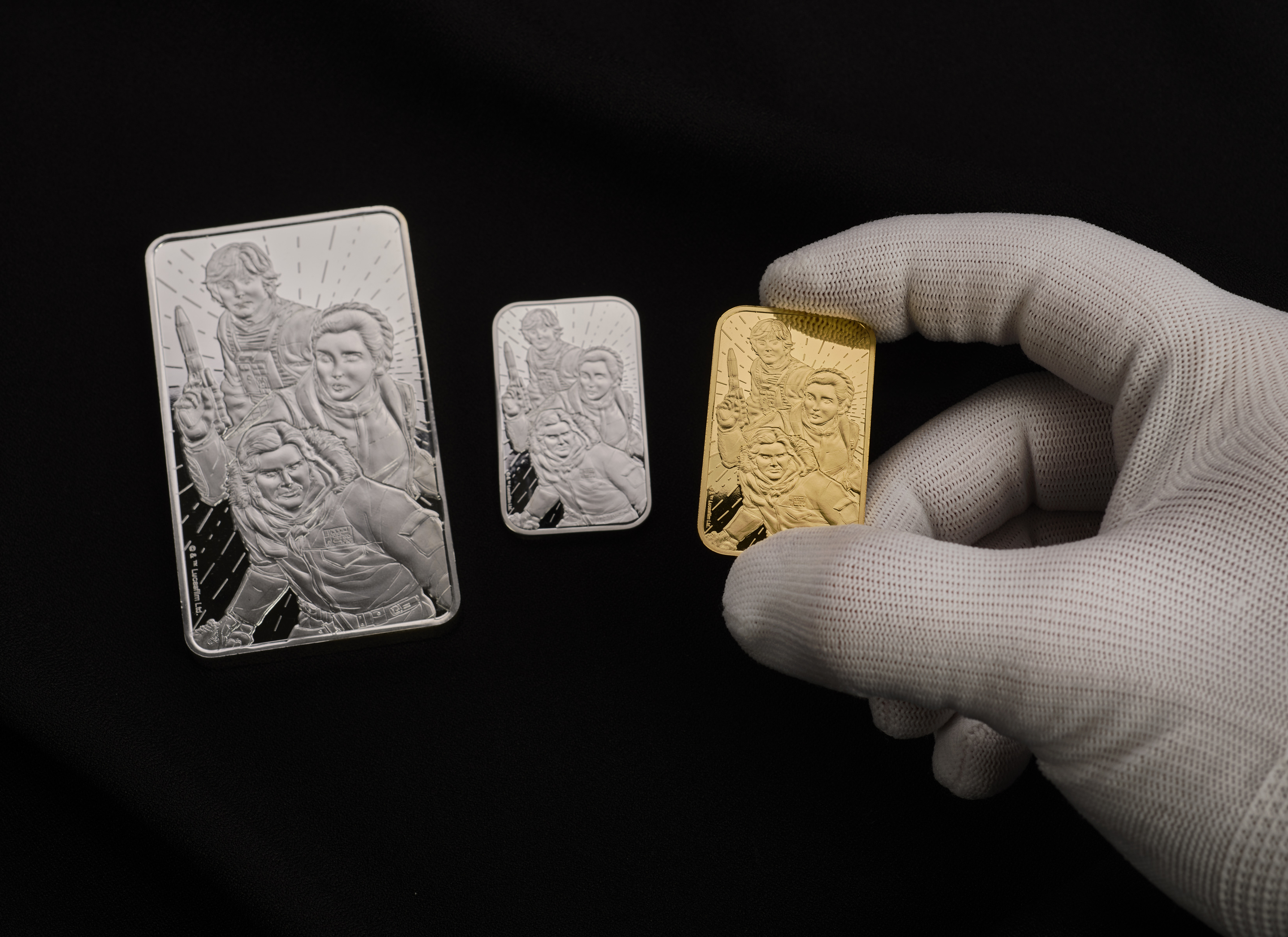 The bullion bar designs feature Luke Skywalker, Princess Leia, and Han Solo