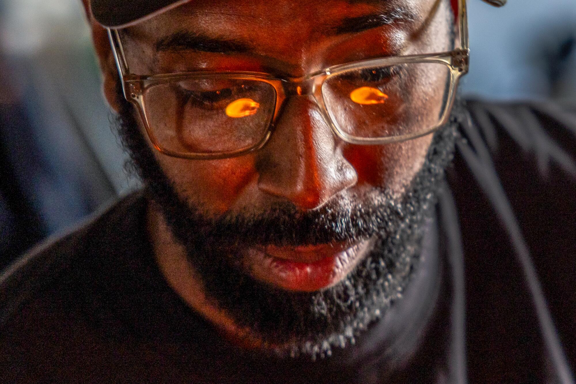 Glassblower Cedric Mitchell at work in his El Segundo studio. 