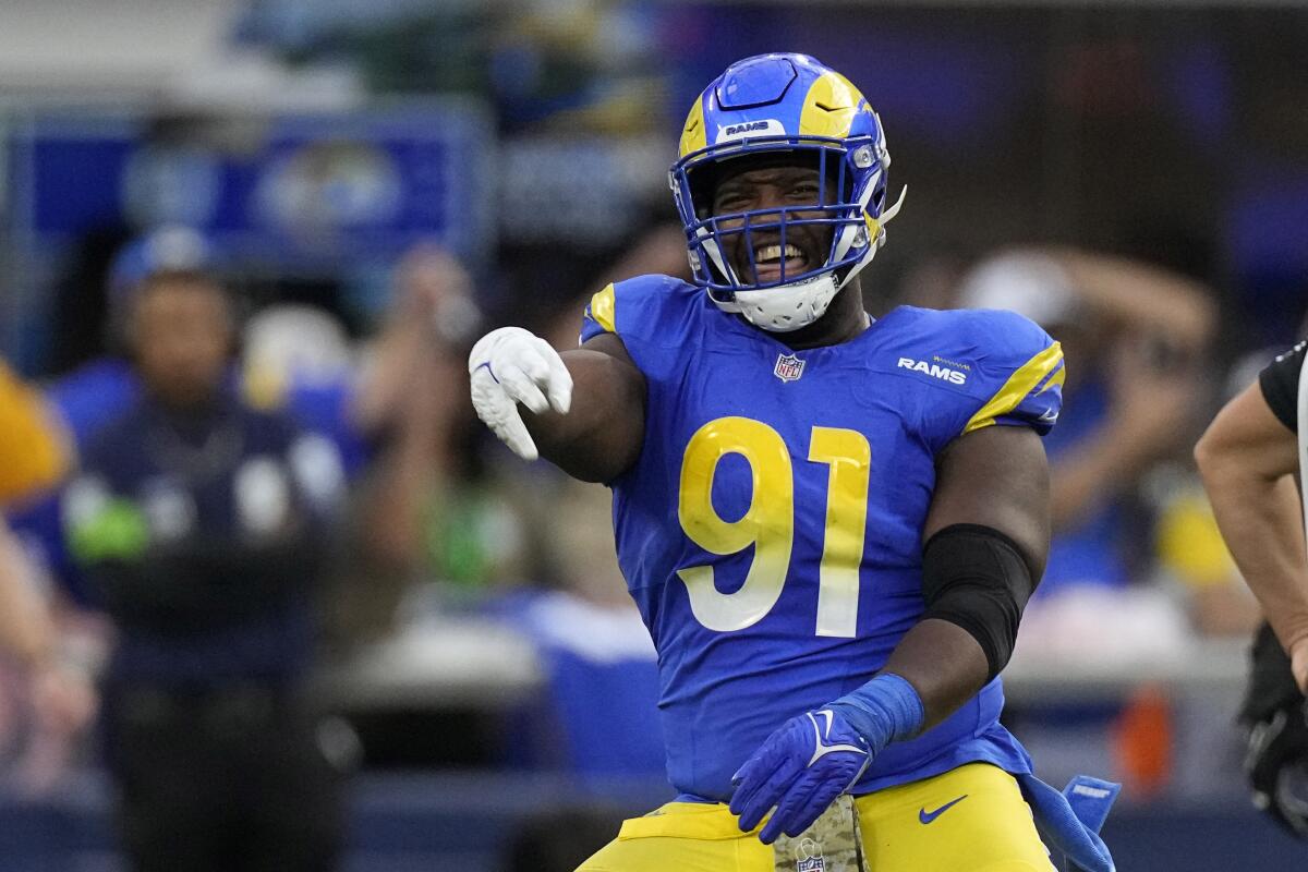 Rams defensive tackle Kobie Turner celebrates one of his nine sacks last season.