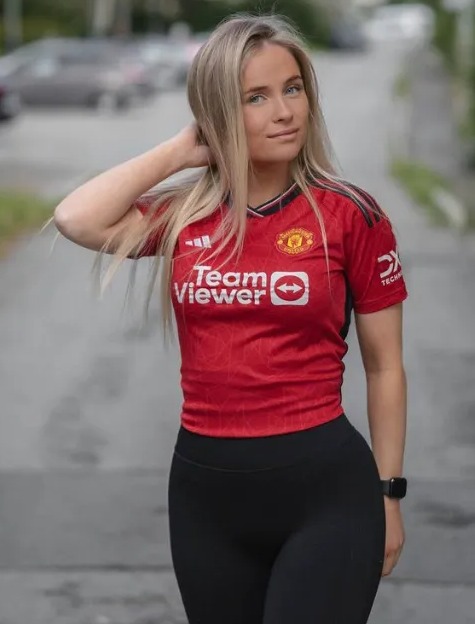 She is often seen in a Manchester United shirt