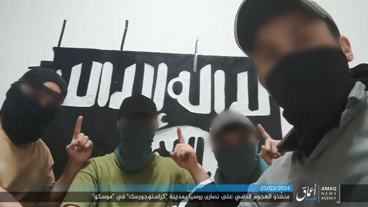 ISIS even released an alleged picture of the four gunmen posing by their black flag before the attack