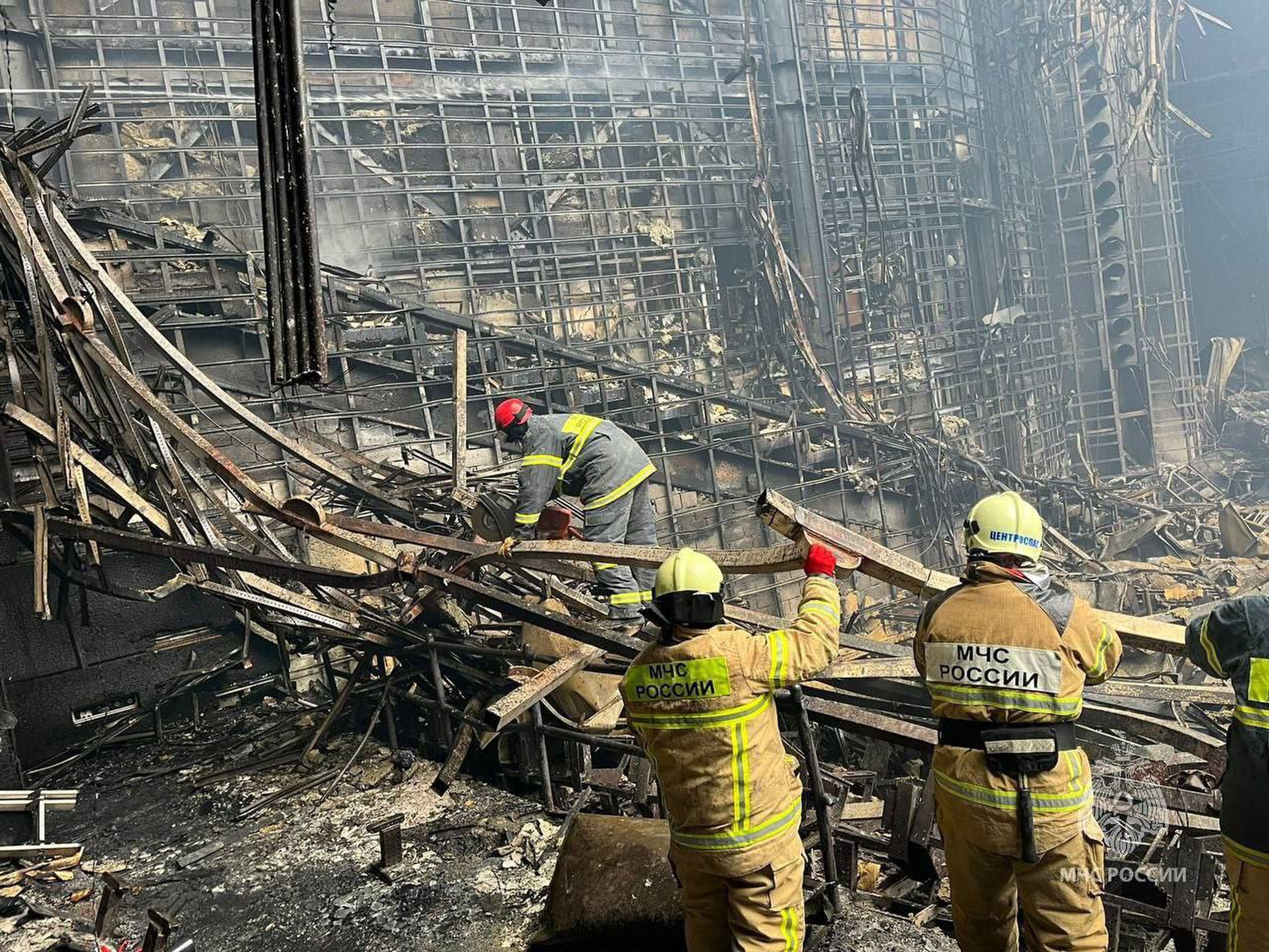 Emergency workers are still trawling through the concert hall wreckage