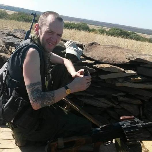 The mercenary brazenly shared this picture of himself in military gear on Facebook