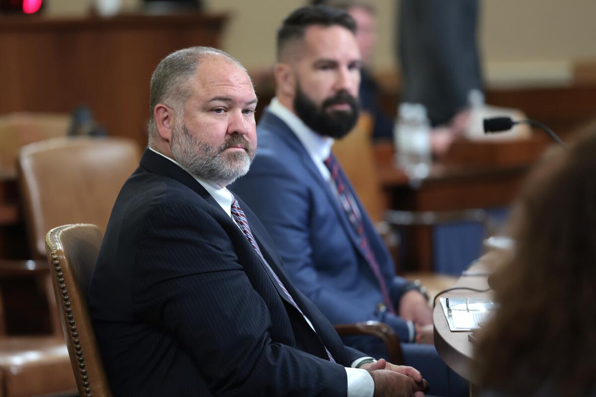 IRS agents Gary Shapley, left, and Joseph Ziegler testify before Congress in December 2023. 