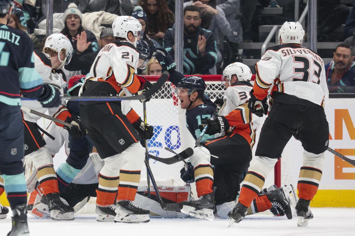 Seattle Kraken center Jaden Schwartz celebrates after scoring past Ducks goaltender Lukas Dostal.