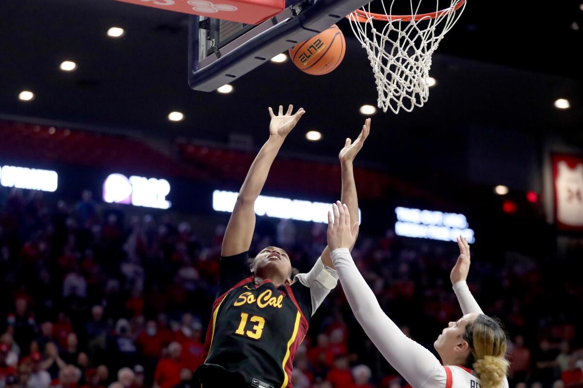 USC center Rayah Marshall vies for the ball near the hoop.