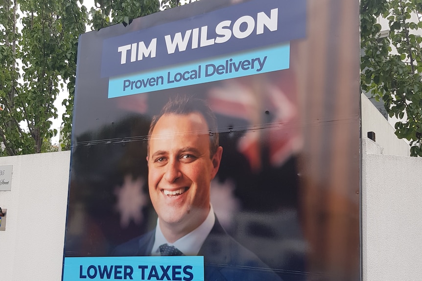 Billboard sits on a street in the seat of Goldstein outside a suburban home.