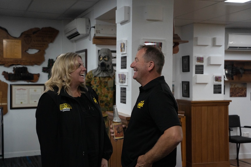 Close up of Troy Pfitzner and Rebekah Pentland watching the election night coverage at a JLN function.