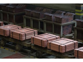 Newly-made copper cathode sheets stancd stacked on wagons before they are moved from the electrolysis shop at the Uralelectromed Copper Refinery, operated by Ural Mining and Metallurgical Co. (UMMC), in Verkhnyaya Pyshma, Russia, on Thursday, July 30, 2020. Gold surged to a fresh record Friday fueled by a weaker dollar and low interest rates. Silver headed for its best month since 1979. Photographer: Andrey Rudakov/Bloomberg